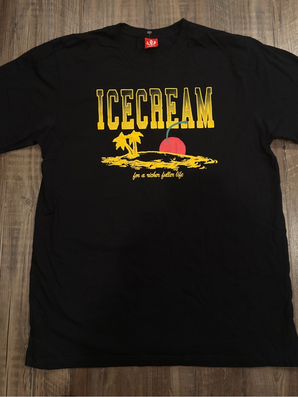ICECREAM Black Short-Sleeve Tee with Yellow Logo and Red Graphic